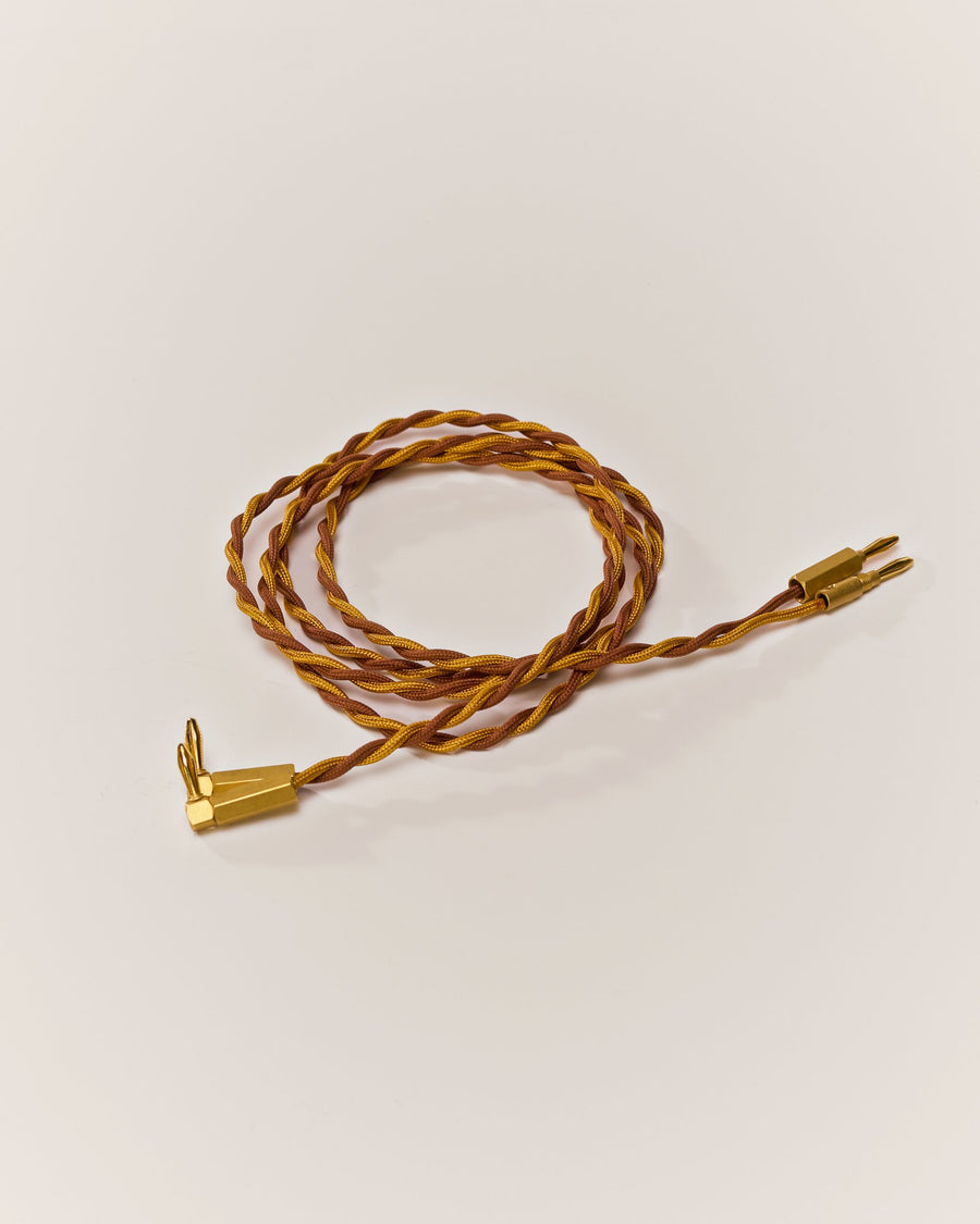 Braided speaker wire in Brass & Brown with brass banana plugs